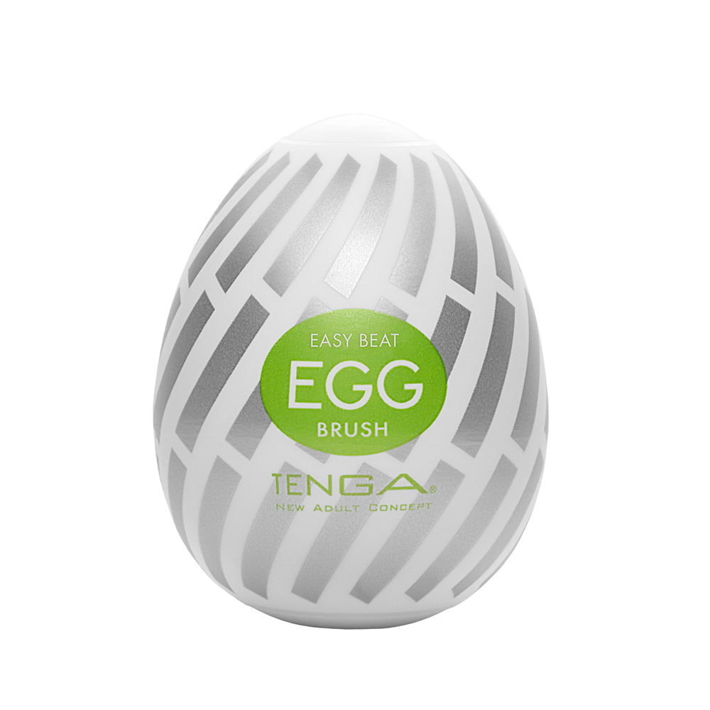 White Tenga Egg Brush with a soft, bristled interior texture.