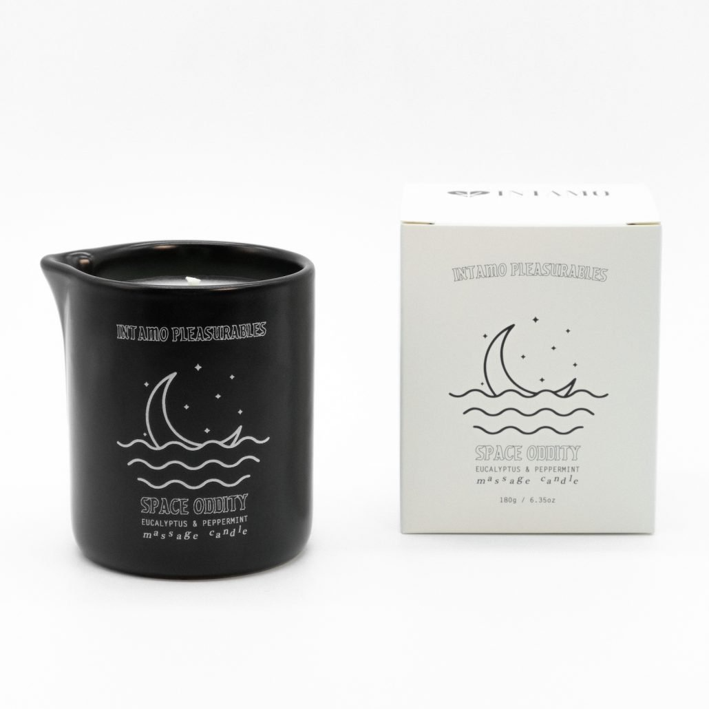Blue Intamo Space Oddity Massage Candle with a refreshing Eucalyptus Peppermint scent.