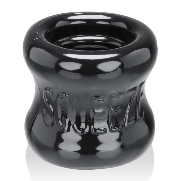 Black OXBALLS SQUEEZE Ballstretcher with a thick, ergonomic design.