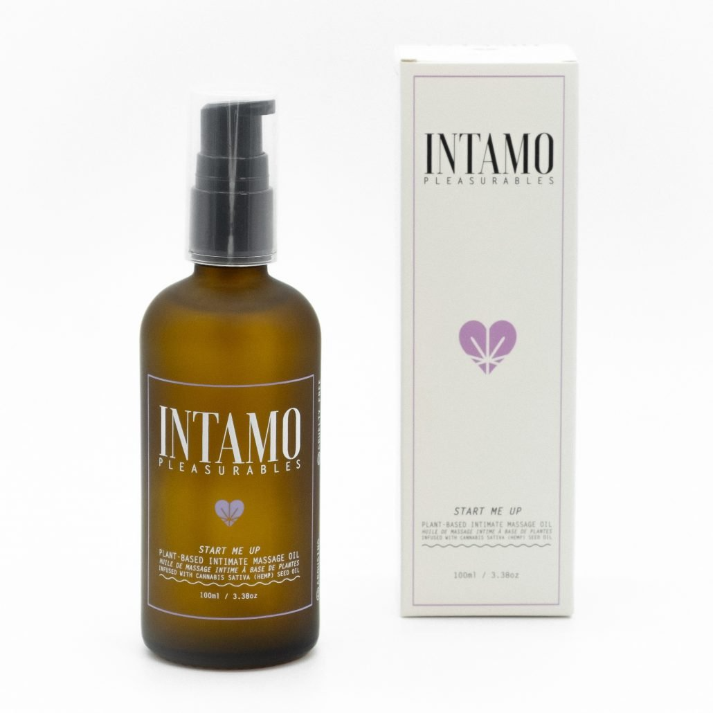 Clear Intamo Start Me Up Massage Oil with a warming, aromatic blend.